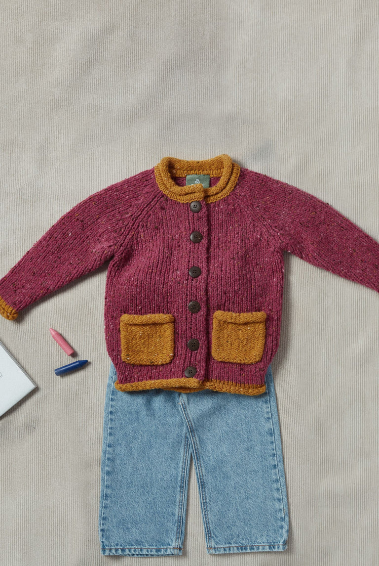Aran Woollen Mills Solas Children’s Roll Neck Cardigan Rose Haze