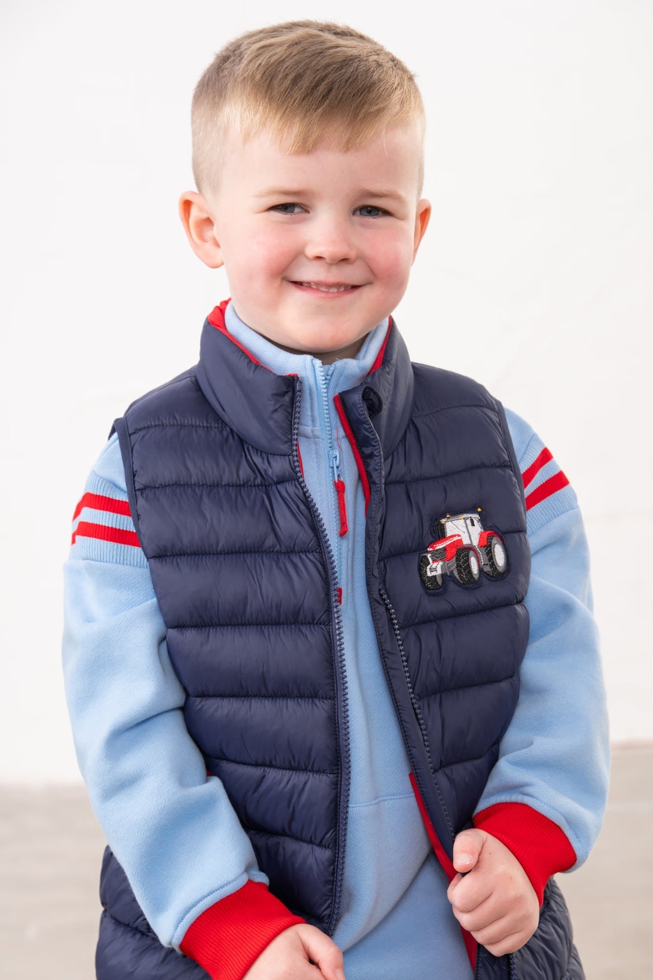 Little Lighthouse Abel Padded Navy Gilet for boys with Red Tractor